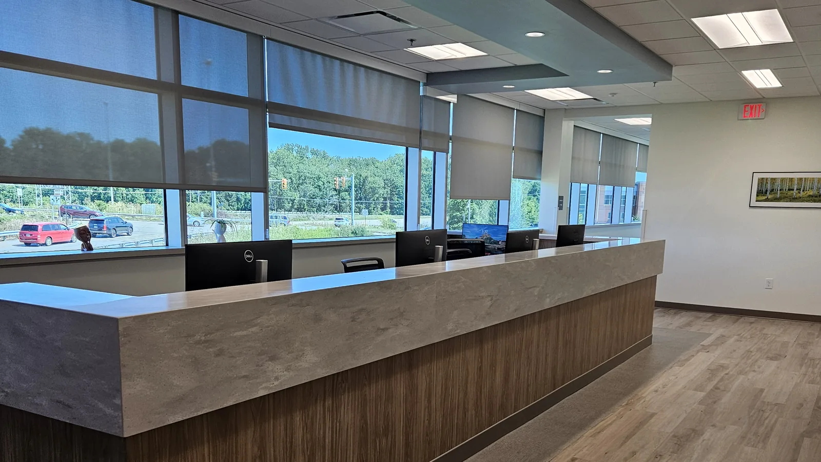 The check-in desk at our Akron office, with the waiting-area windows behind it